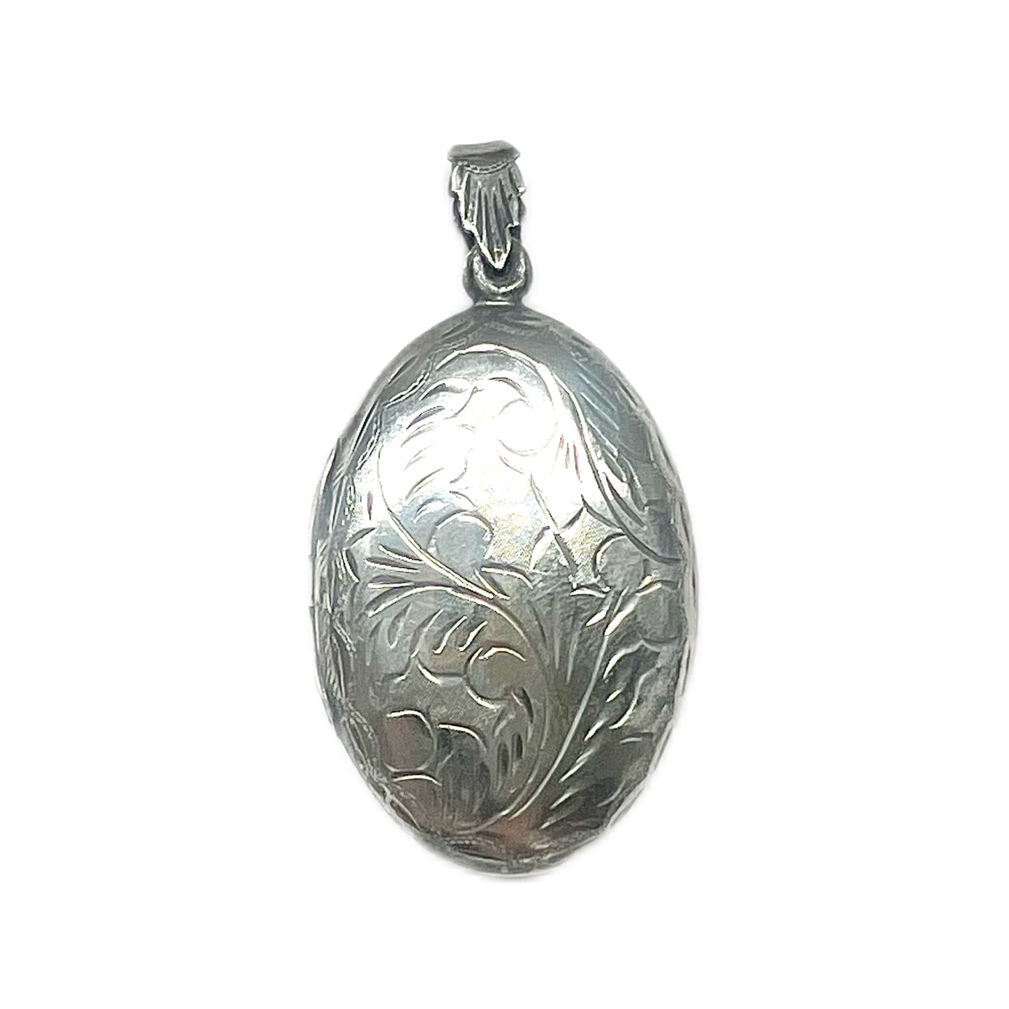 Vintage sterling silver locket with engraved designs