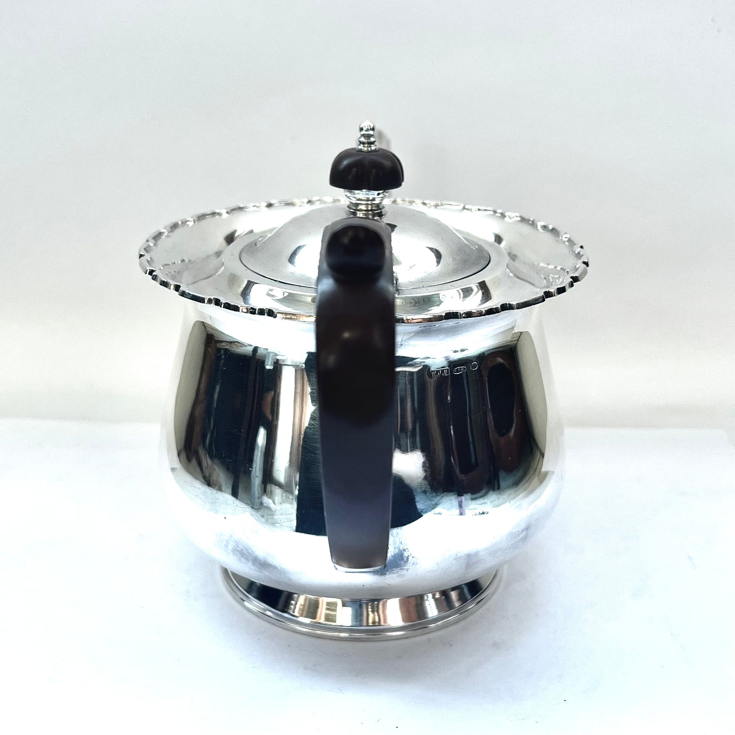 1930s Australian W.J. Sanders sterling silver teapot with Art Deco finial and handles, likely bakelite