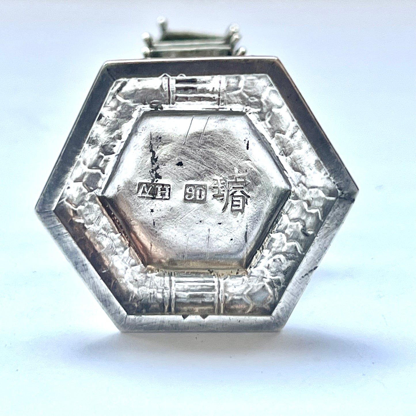 Early 20th century pagoda novelty form pepperette, marks for .900 silver and Wang Hing