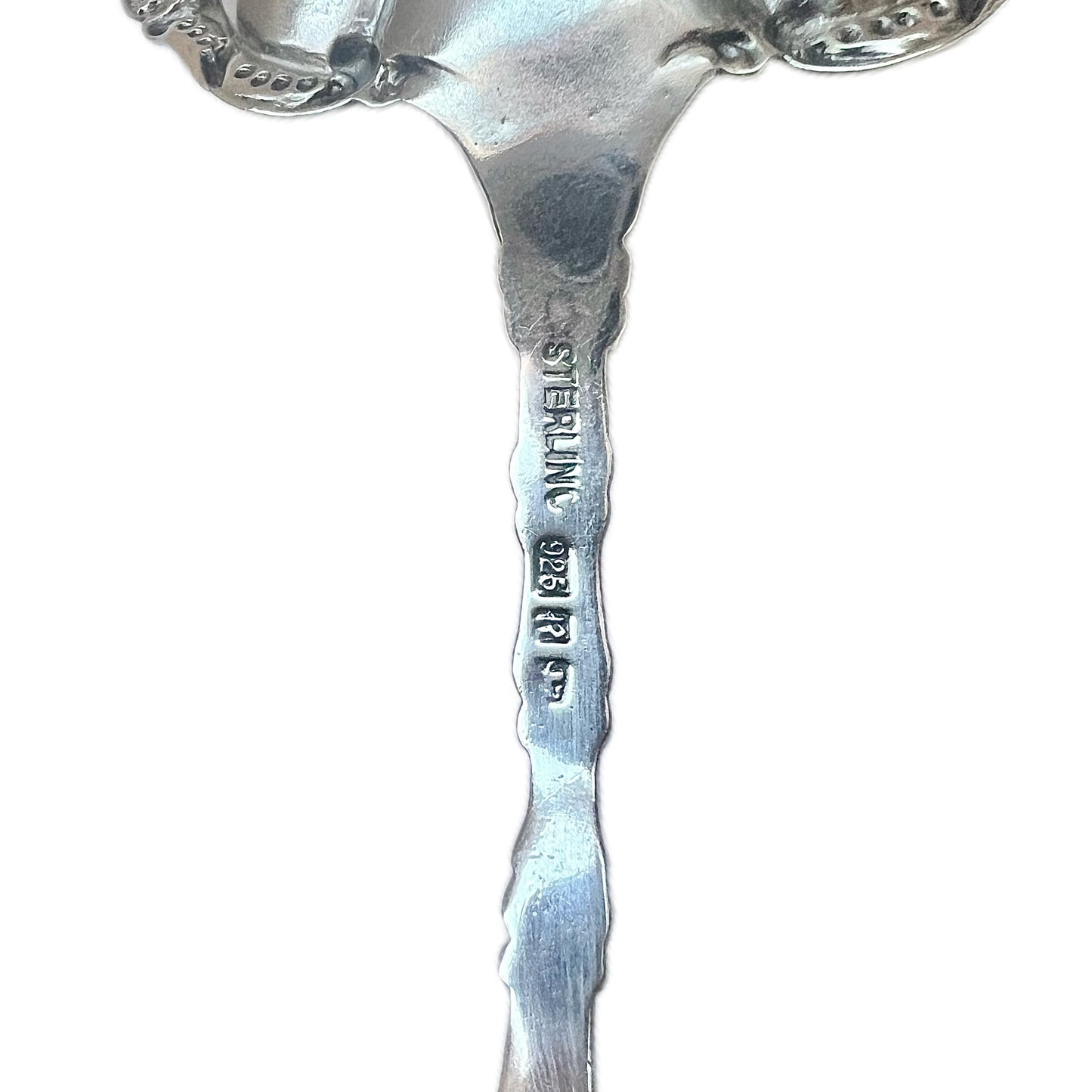 Antique sterling silver pierced spoon