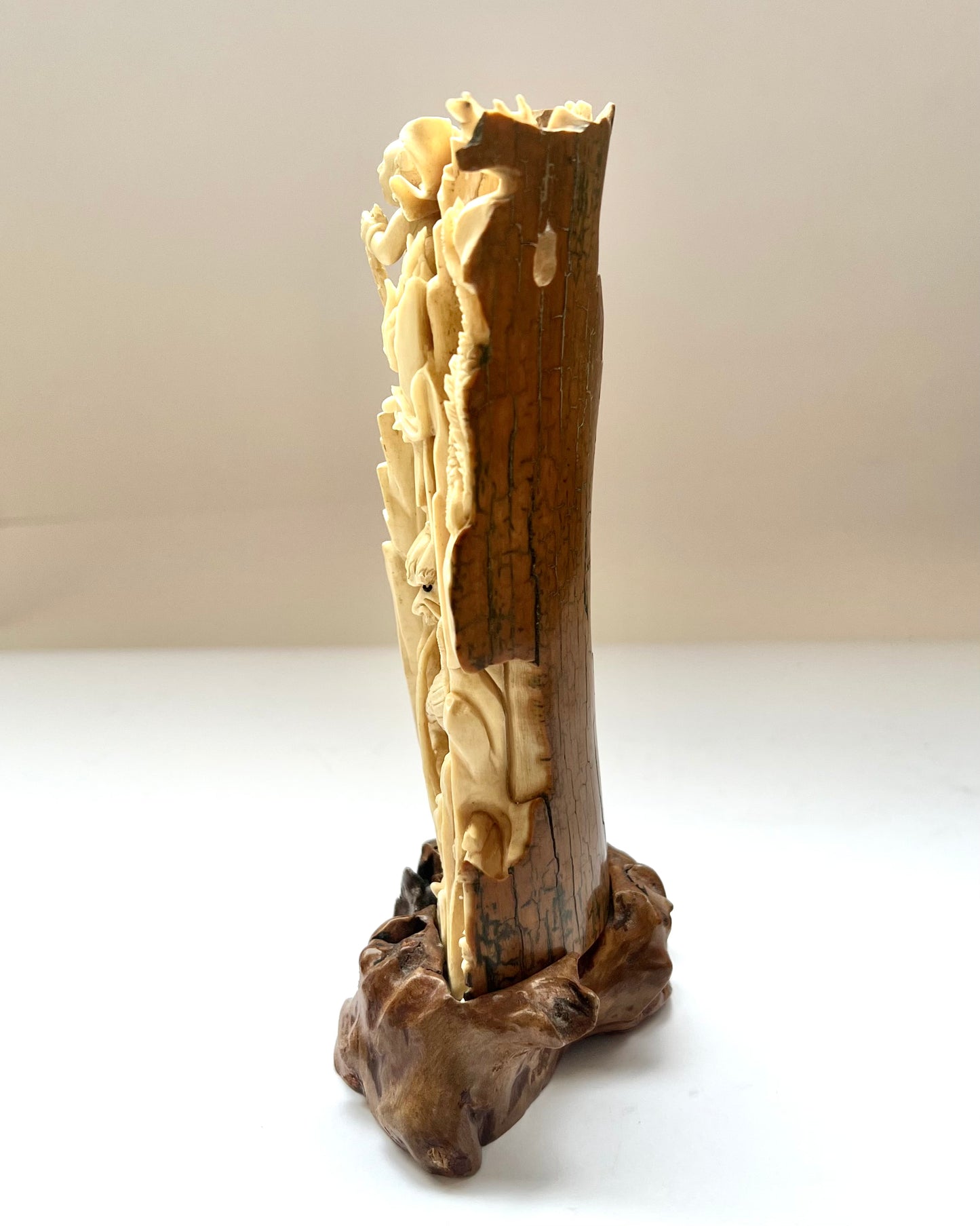 Early to mid 19th century Qing dynasty ivory carving of Nezha subduing Ao Guang, the Dragon King of the East Sea