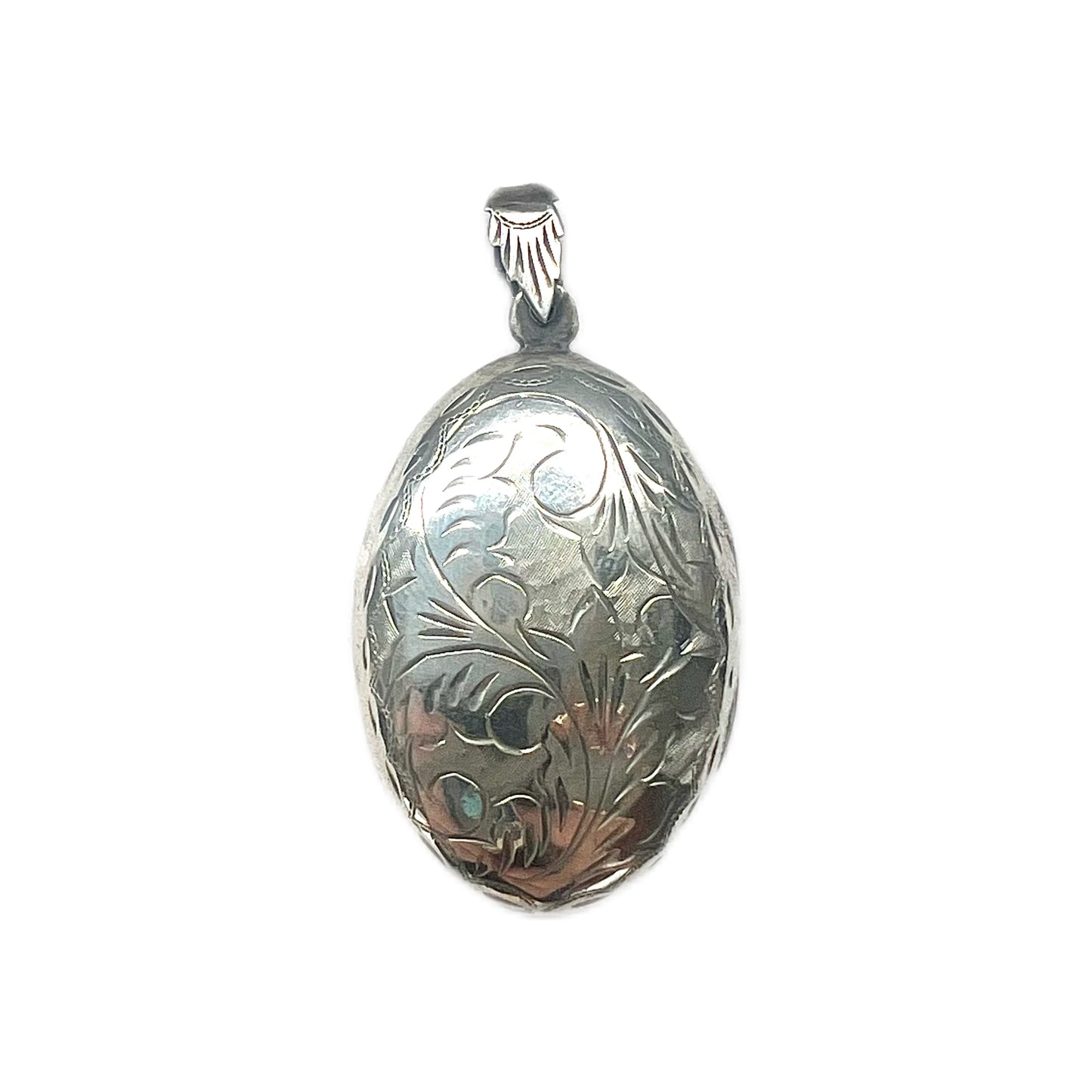 Vintage sterling silver locket with engraved designs