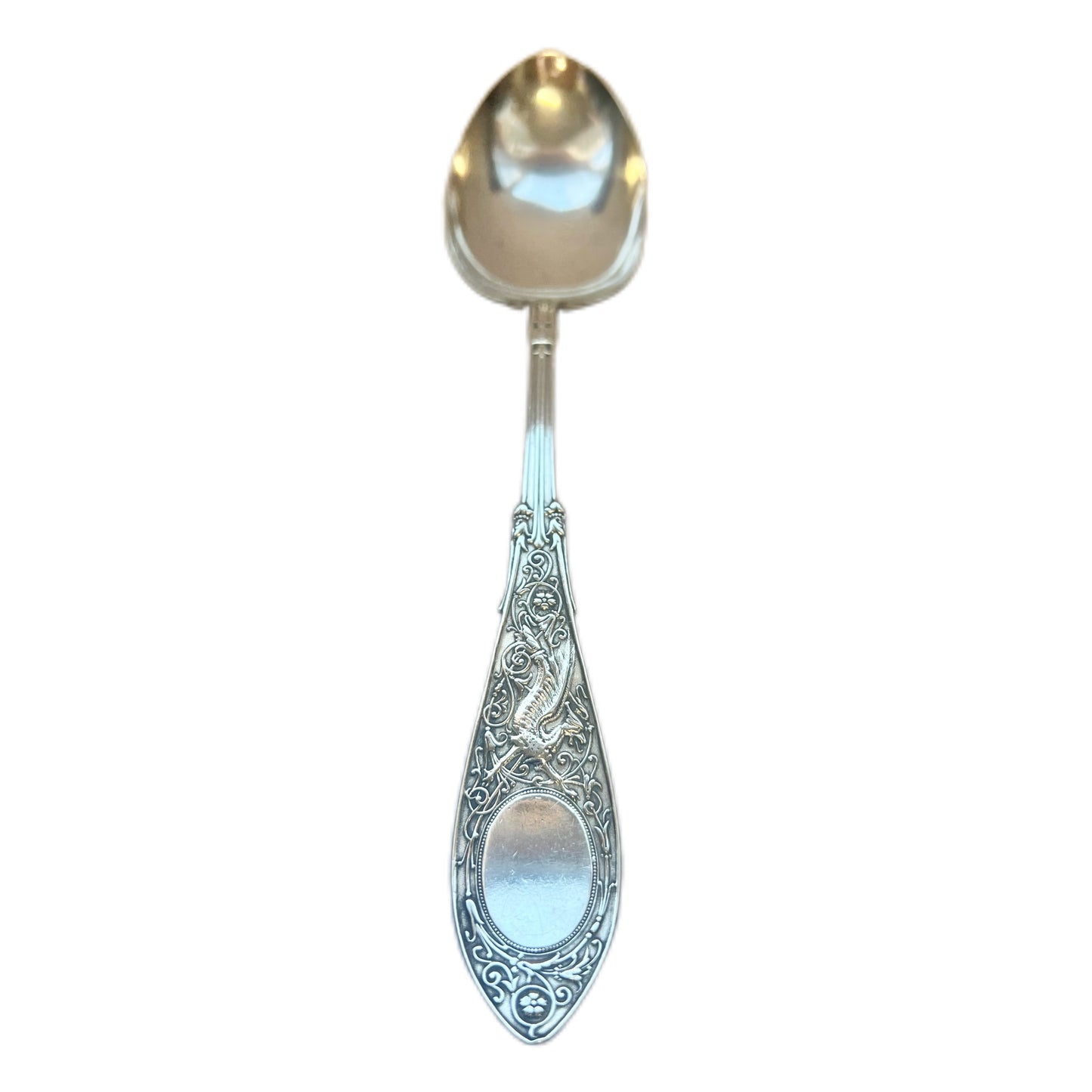 Antique Arabesque pattern sterling silver spoon by the Whiting Manufacturing Company circa 1875 to 1926