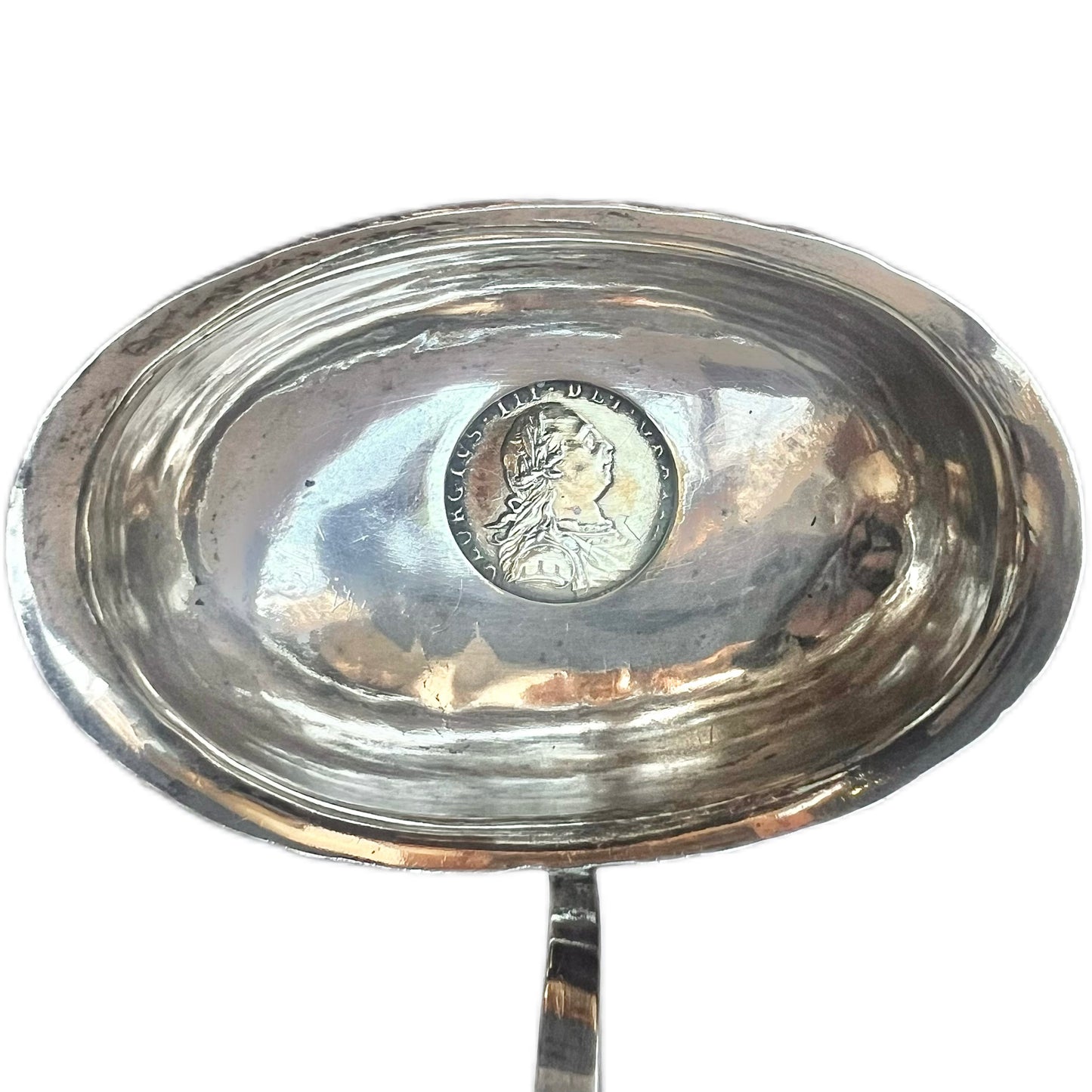 Late 18th to early 19th century sterling silver toddy ladle with ivory handle and gold-plated George III 1787 shilling