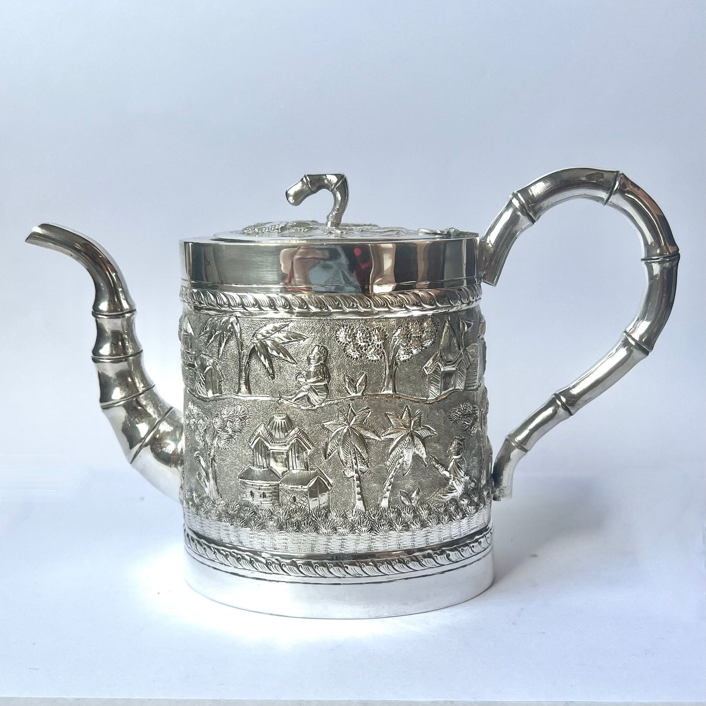 Late Victorian to Edwardian period Anglo-Indian Calcutta silver tea set comprising teapot, sugar bowl and creamer jug