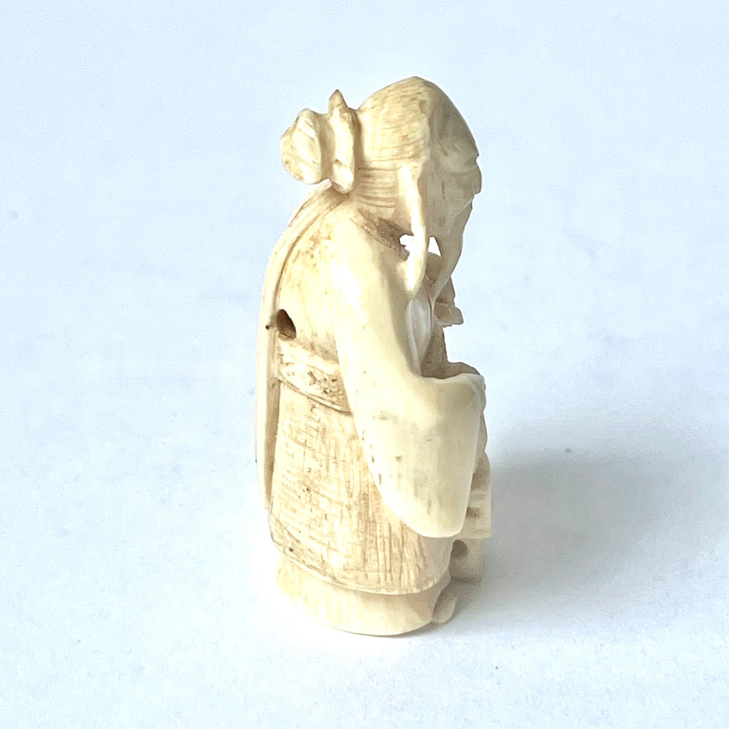Antique Japanese ivory netsuke of a sage signed by Kiko