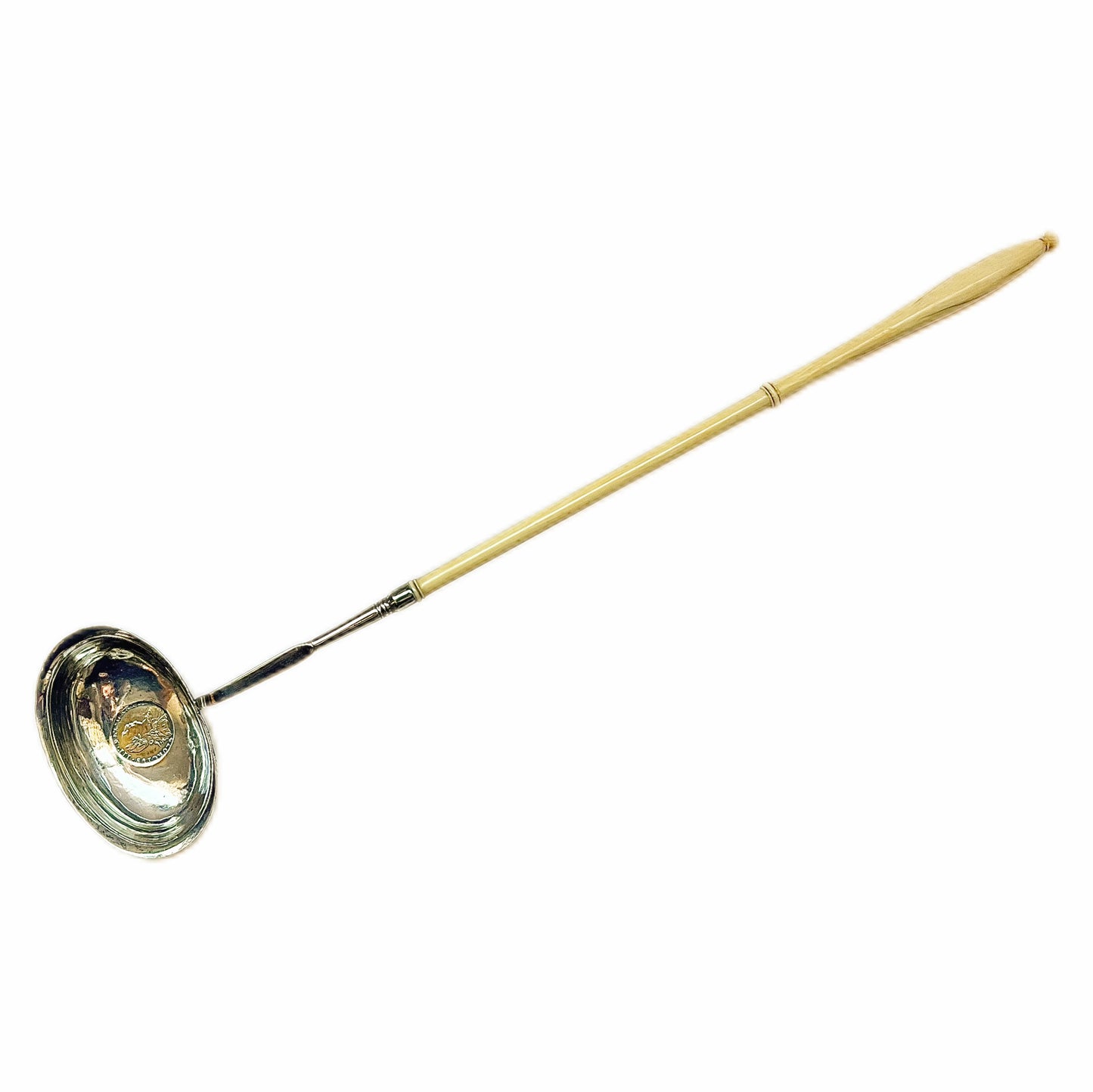 Late 18th to early 19th century sterling silver toddy ladle with ivory handle and gold-plated George III 1787 shilling