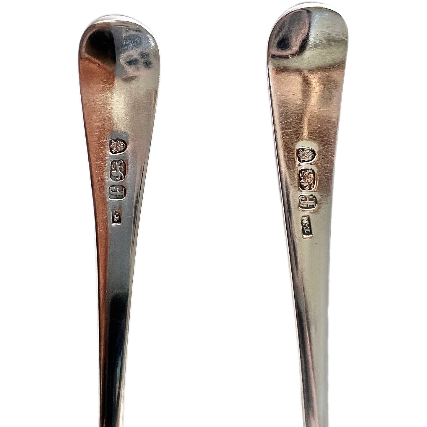 Pair of antique George III crested sterling silver tablespoons in the Old English Pattern