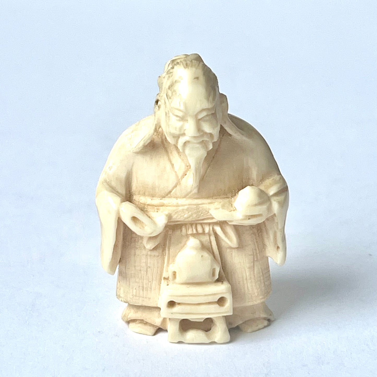 Antique Japanese ivory netsuke of a sage signed by Kiko