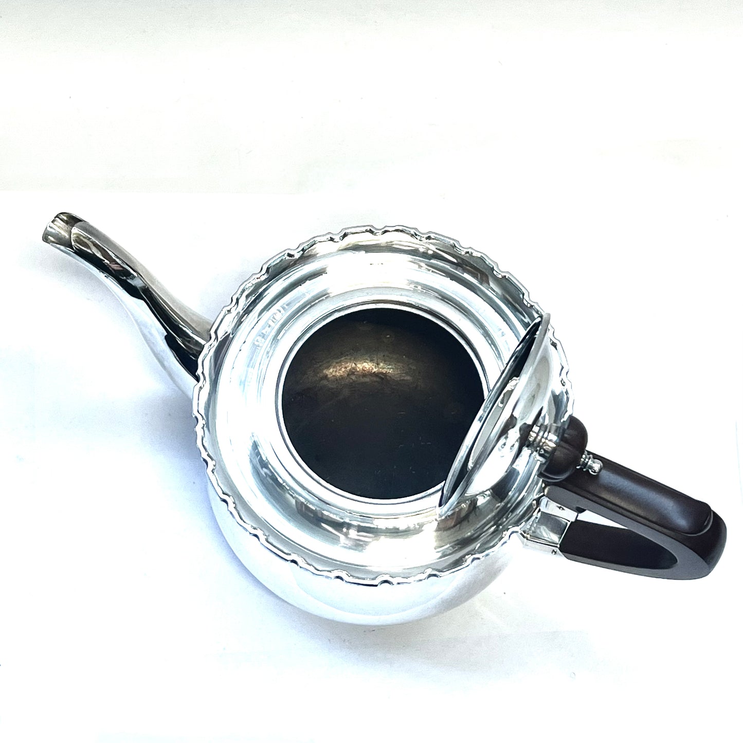 1930s Australian W.J. Sanders sterling silver teapot with Art Deco finial and handles, likely bakelite
