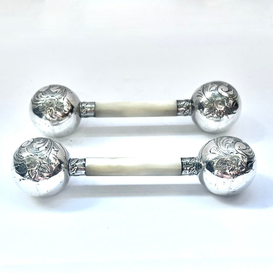Pair of antique weighted sterling silver and mother of pearl knife rests, with marks to mounts for Sheffield, 1904, Alfred Biggin & Son