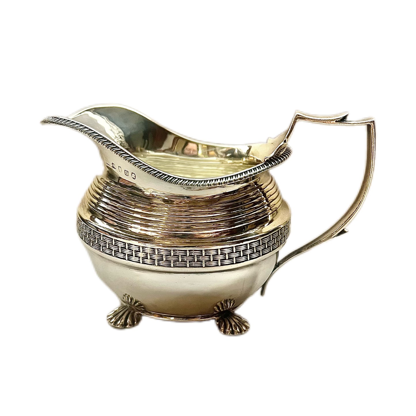 Crested George III sterling silver creamer jug and sugar bowl set