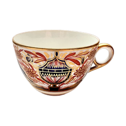 Regency period Minton hard paste porcelain Bute shaped teacup with ringhandle