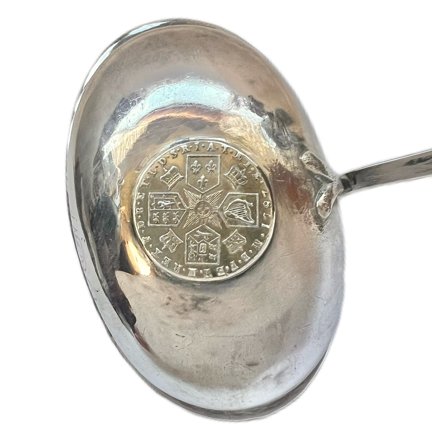 Late 18th to early 19th century sterling silver toddy ladle with ivory handle and gold-plated George III 1787 shilling
