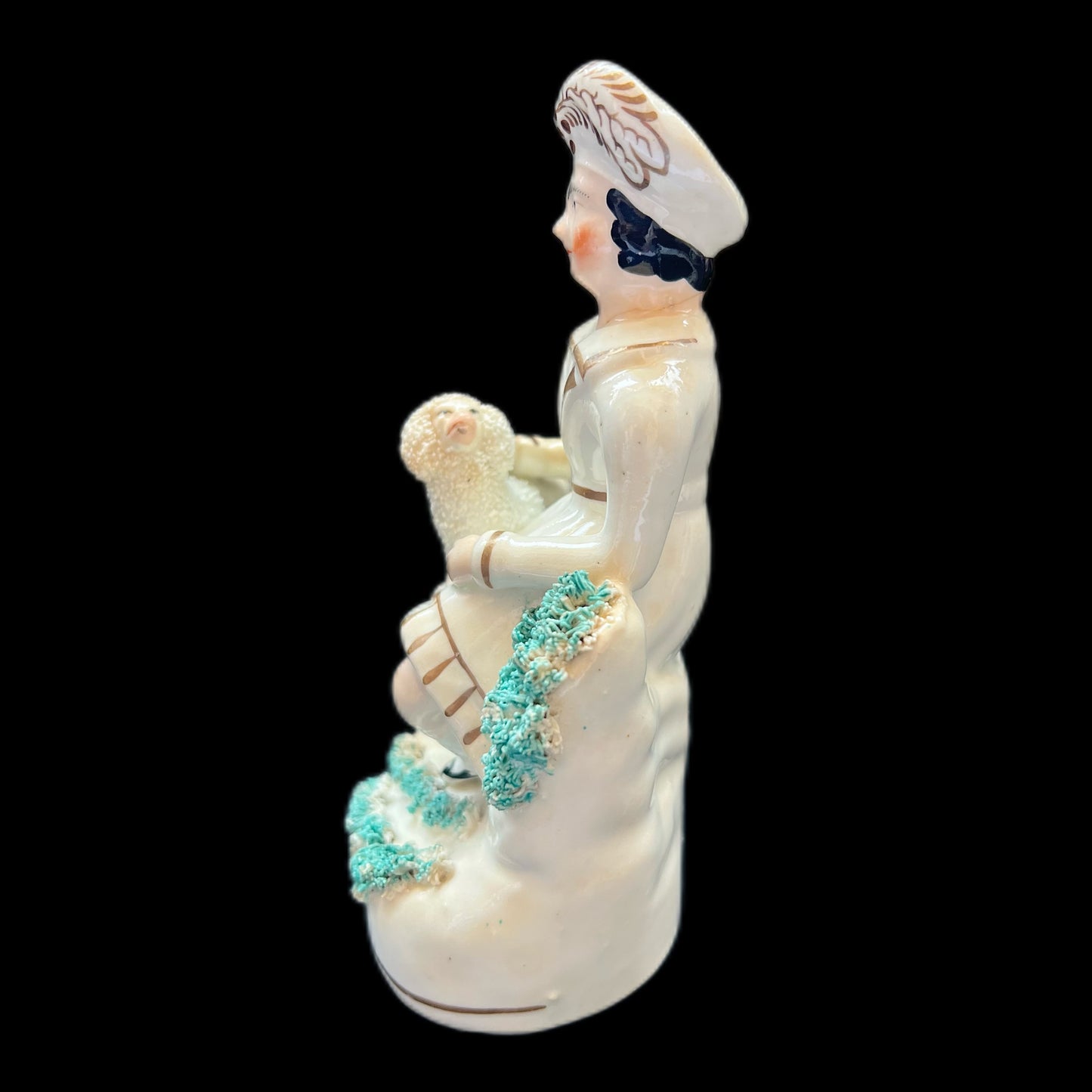 Victorian Staffordshire pottery figurine of a Highland gentleman with his poodle, circa 1840s to 1860s