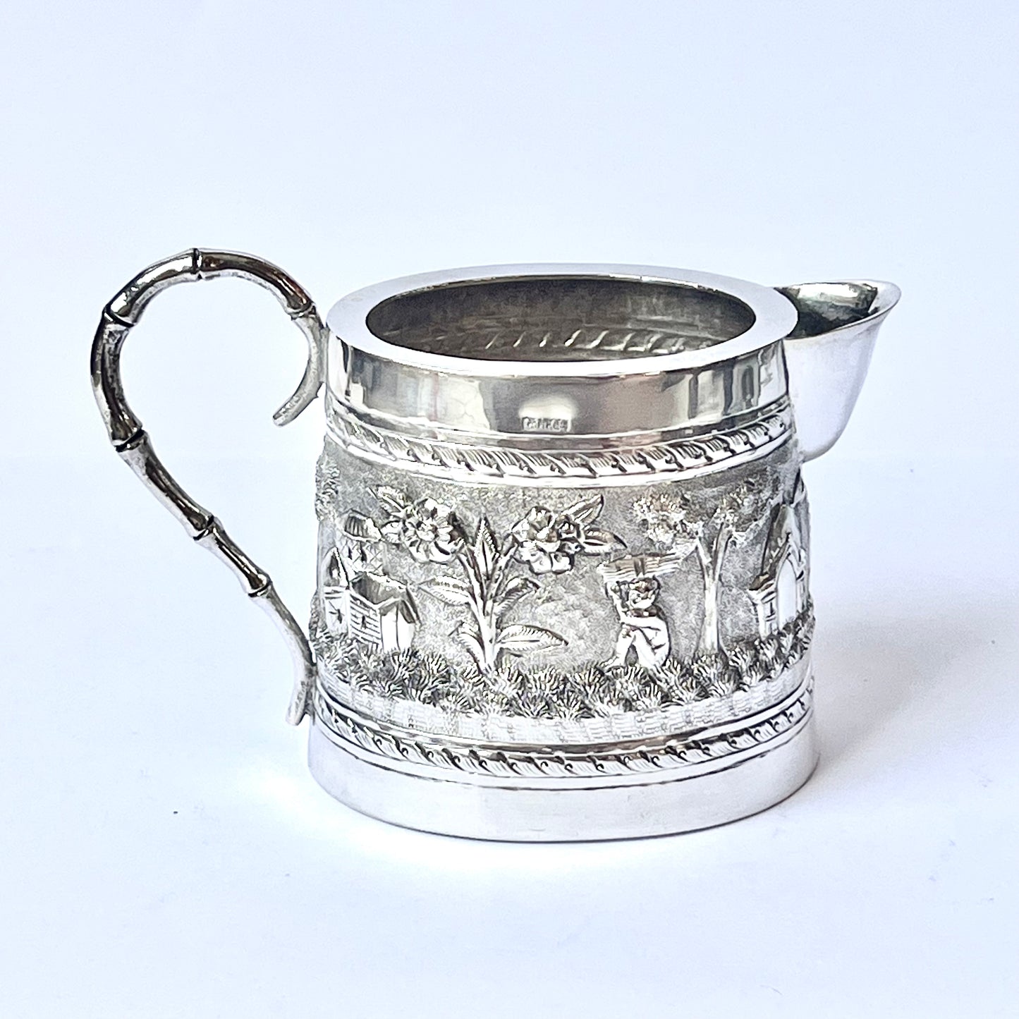 Late Victorian to Edwardian period Anglo-Indian Calcutta silver tea set comprising teapot, sugar bowl and creamer jug