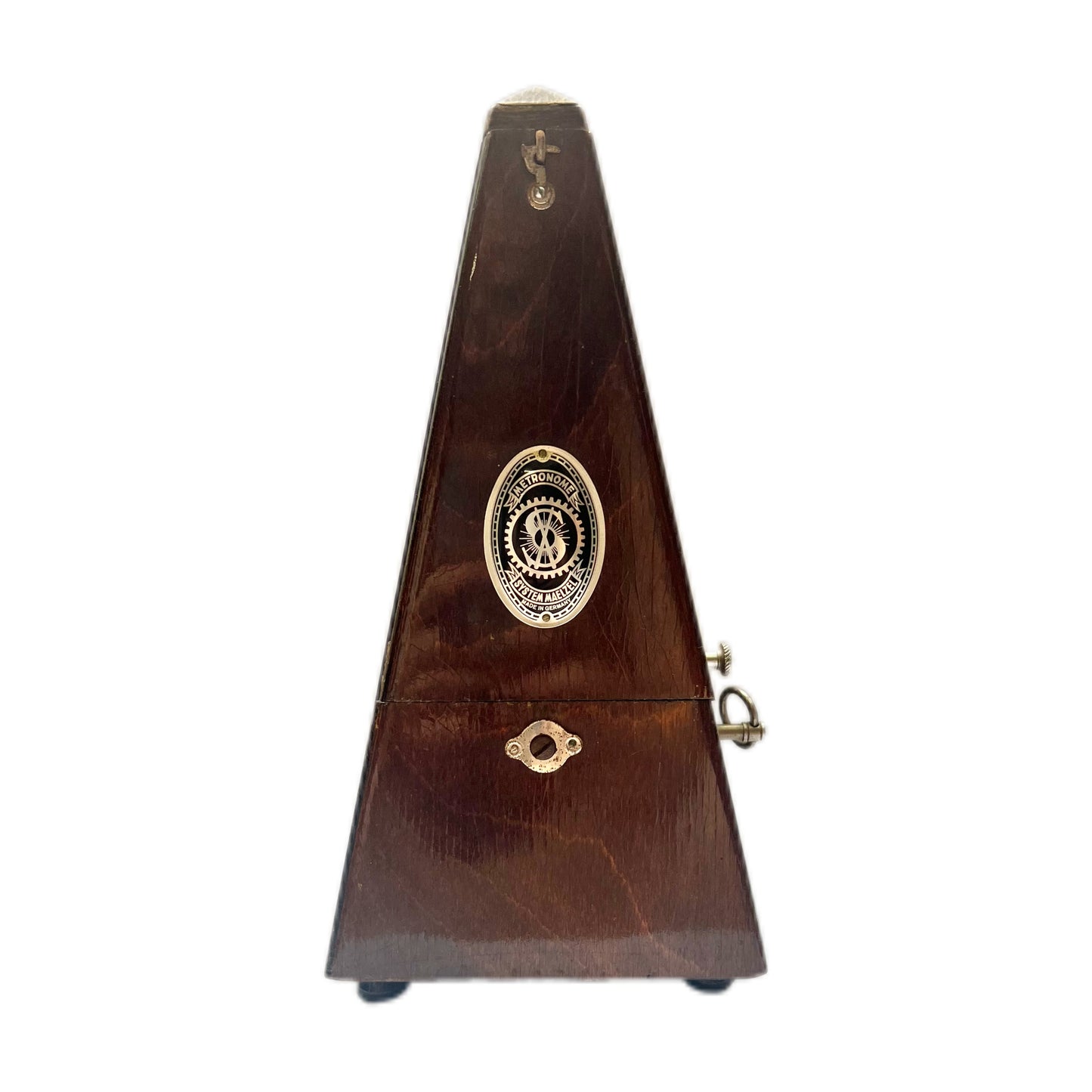 Metrónomo mecánico de principios del siglo XX con campana y sistema de sonido Maelzel y chapa de nogal.