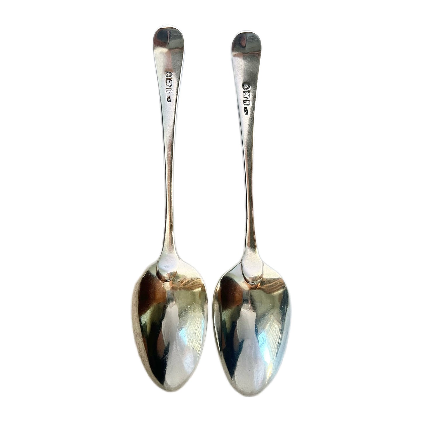 Pair of antique George III crested sterling silver tablespoons in the Old English Pattern