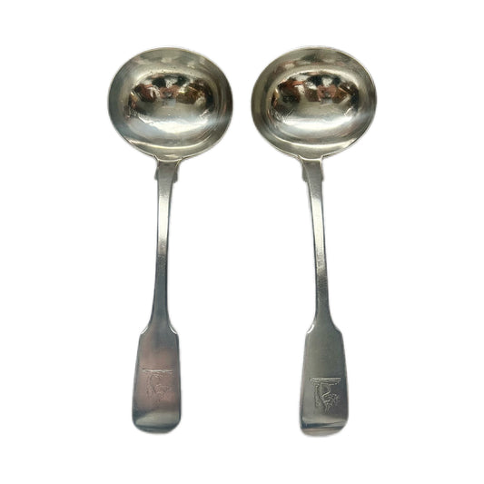 Pair of crested William IV antique sterling silver sauce ladles