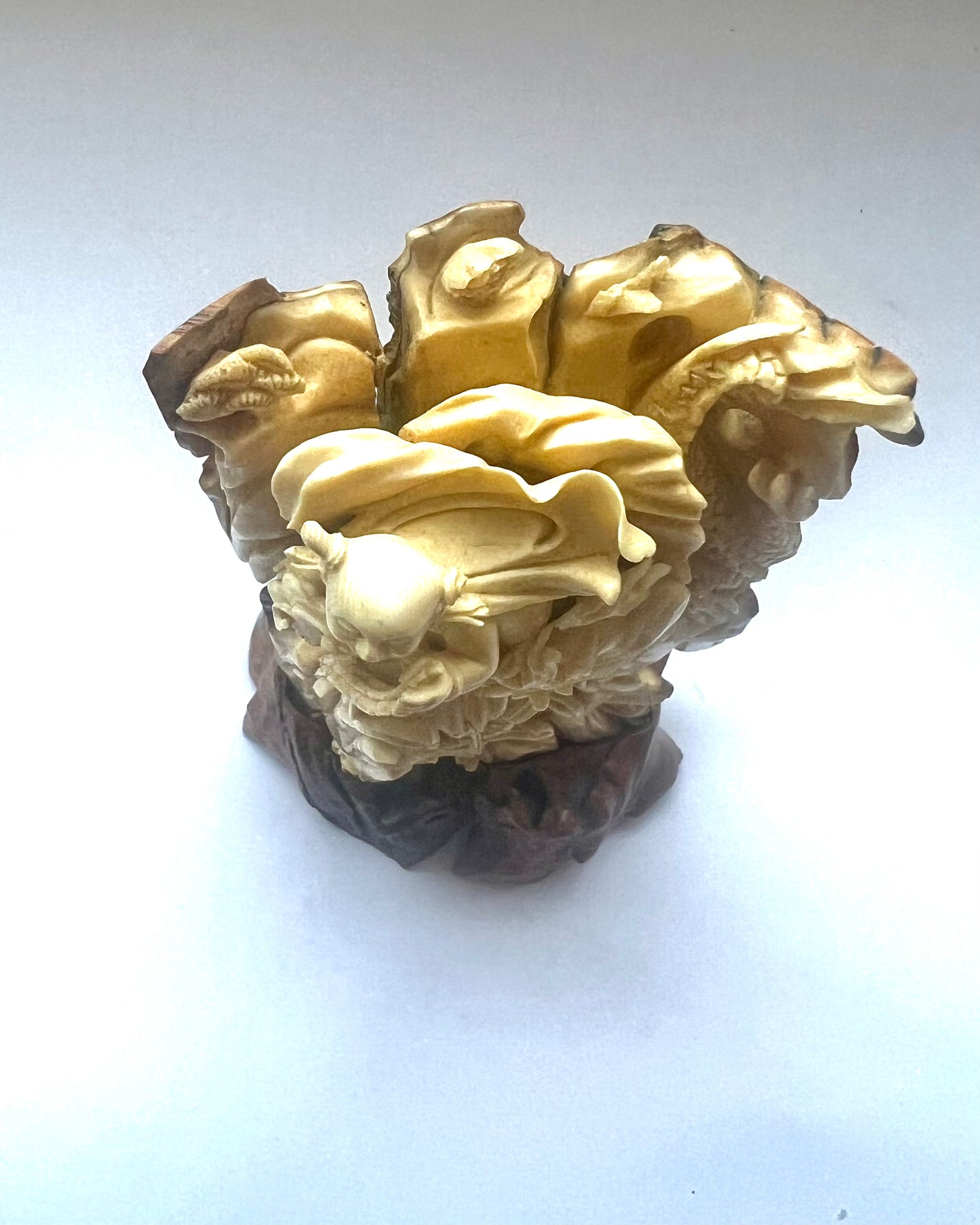 Early to mid 19th century Qing dynasty ivory carving of Nezha subduing Ao Guang, the Dragon King of the East Sea