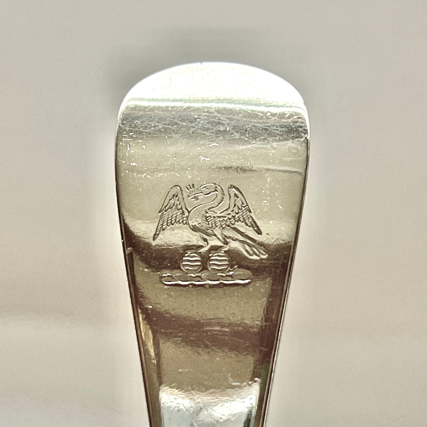 Pair of George V crested sterling silver spoons with marks for Joseph Rodgers & Sons, Sheffield, 1911.