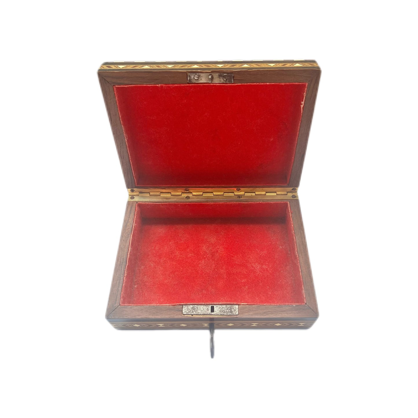 Caja antigua de madera y hueso con interior de terciopelo e incrustaciones.