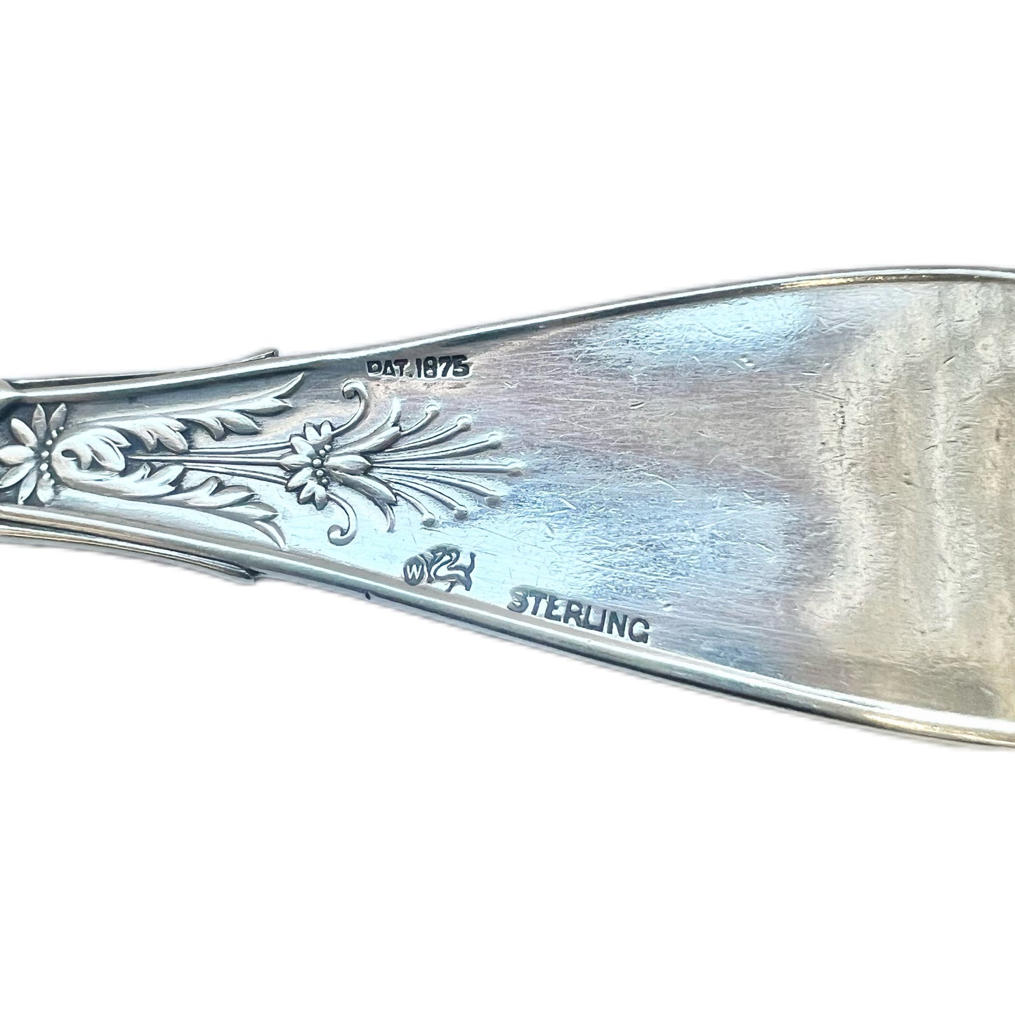 Antique Arabesque pattern sterling silver spoon by the Whiting Manufacturing Company circa 1875 to 1926