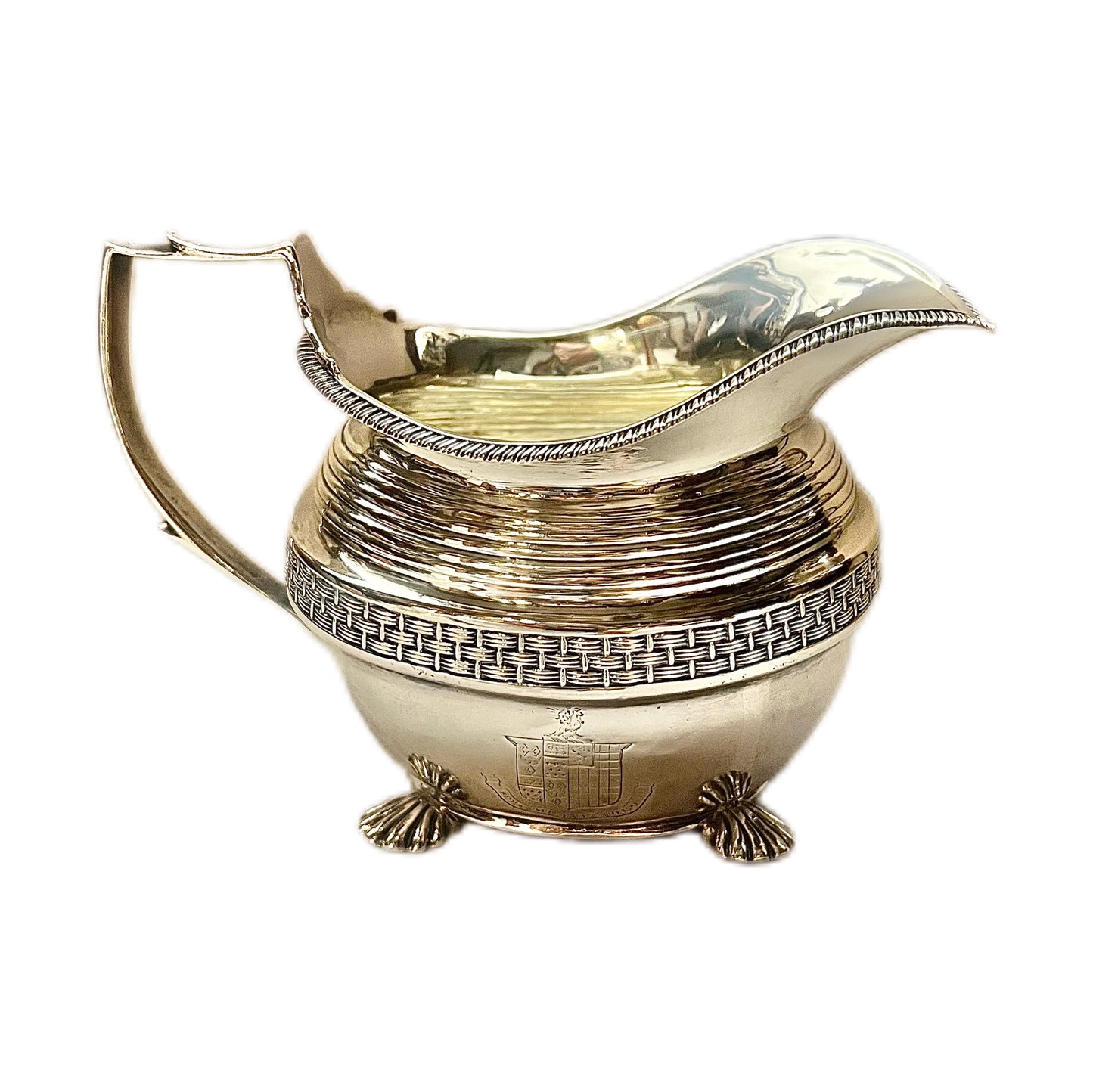 Crested George III sterling silver creamer jug and sugar bowl set