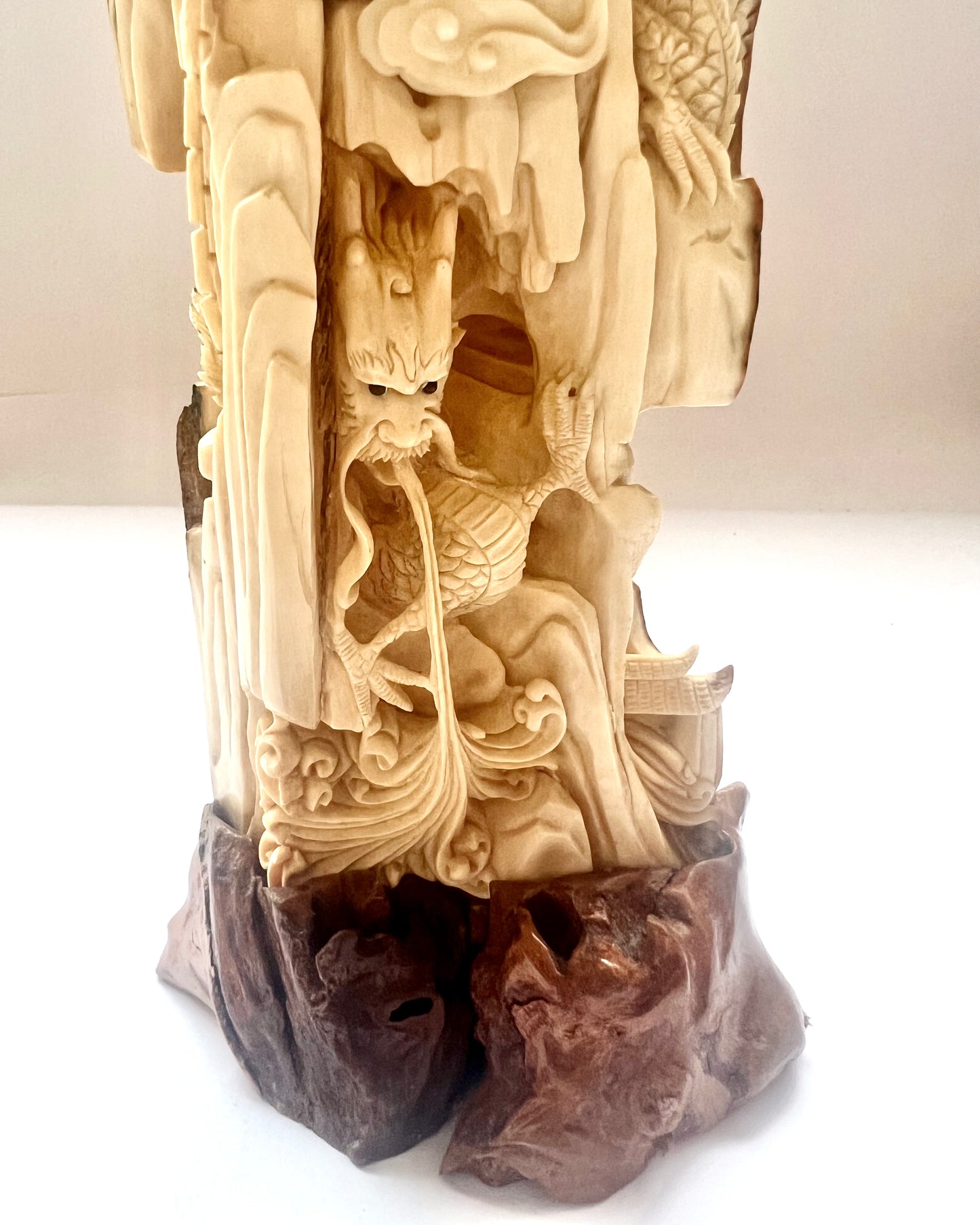 Early to mid 19th century Qing dynasty ivory carving of Nezha subduing Ao Guang, the Dragon King of the East Sea