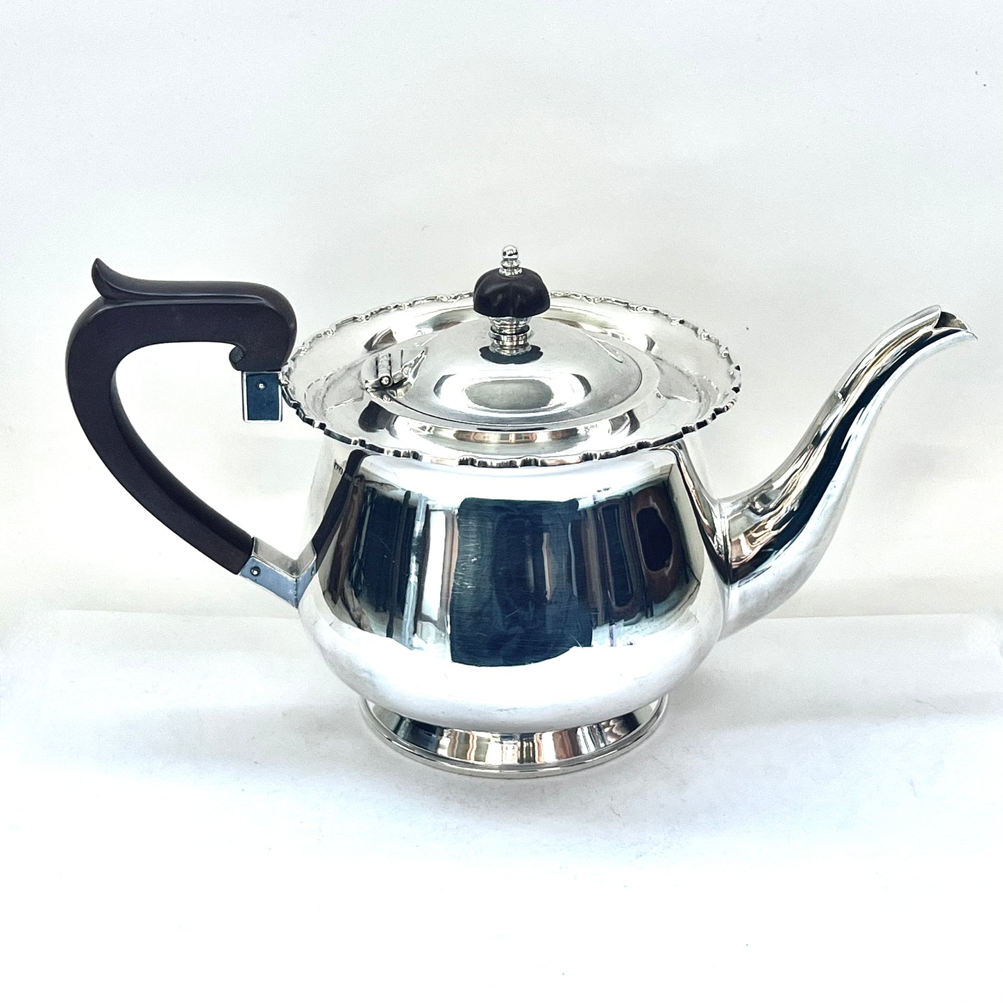 1930s Australian W.J. Sanders sterling silver teapot with Art Deco finial and handles, likely bakelite
