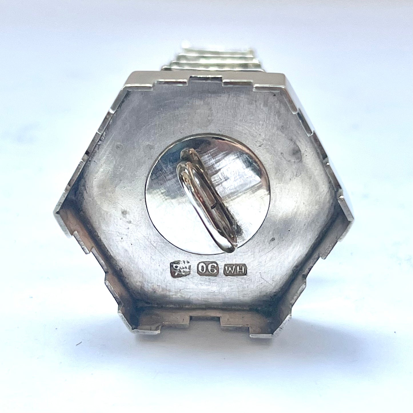 Early 20th century pagoda novelty form pepperette, marks for .900 silver and Wang Hing