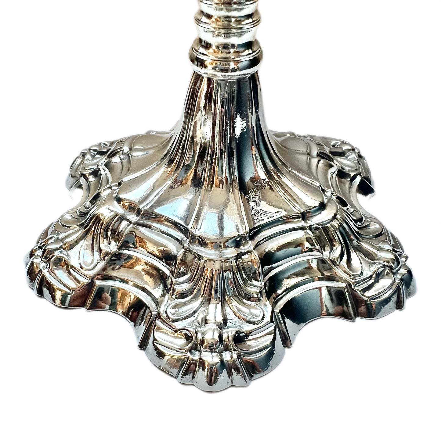 Pair of crested George III sterling silver cast candlesticks by William Cafe, London 1761 and 1762
