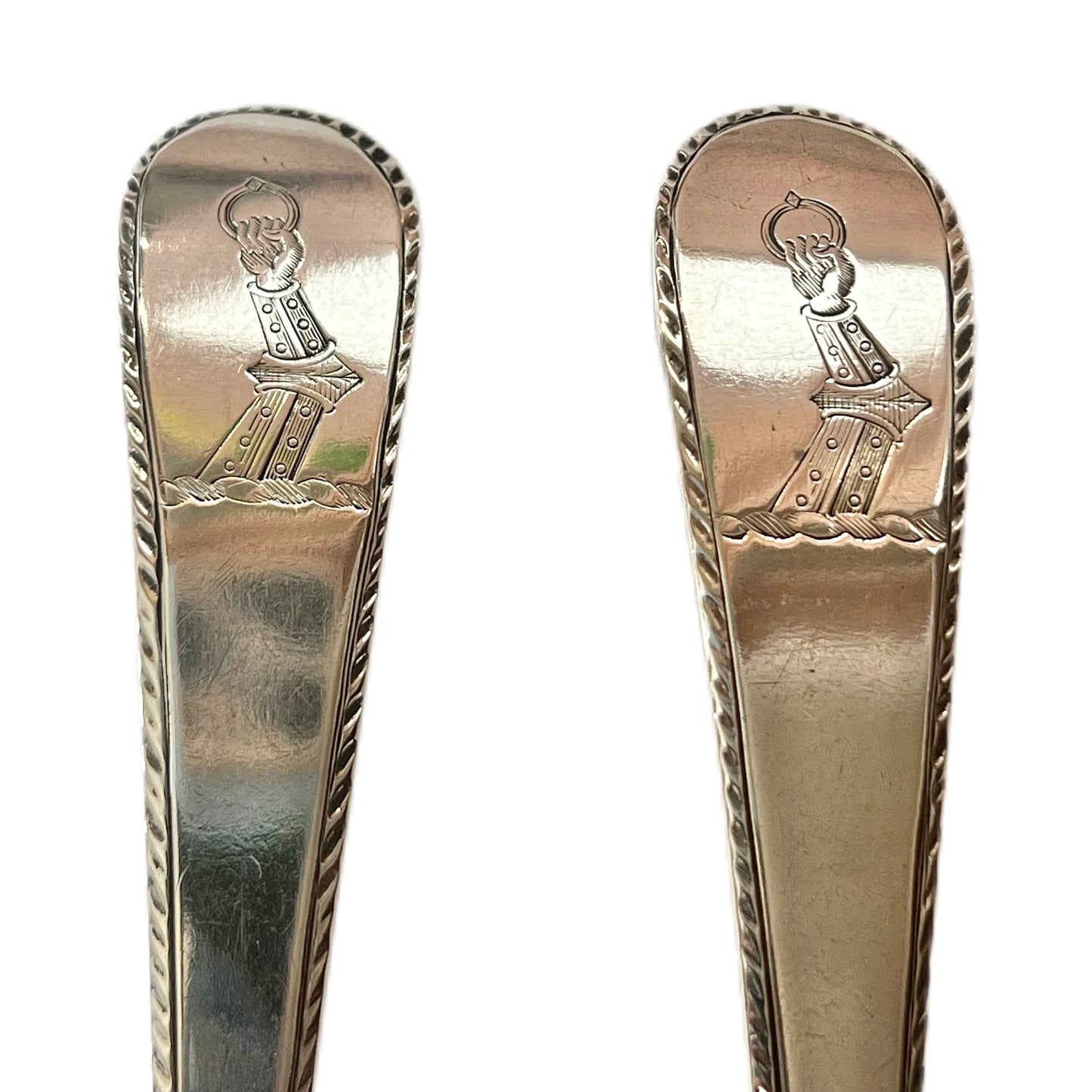 Matching pair of crested George III sterling silver serving spoons by Hester Bateman