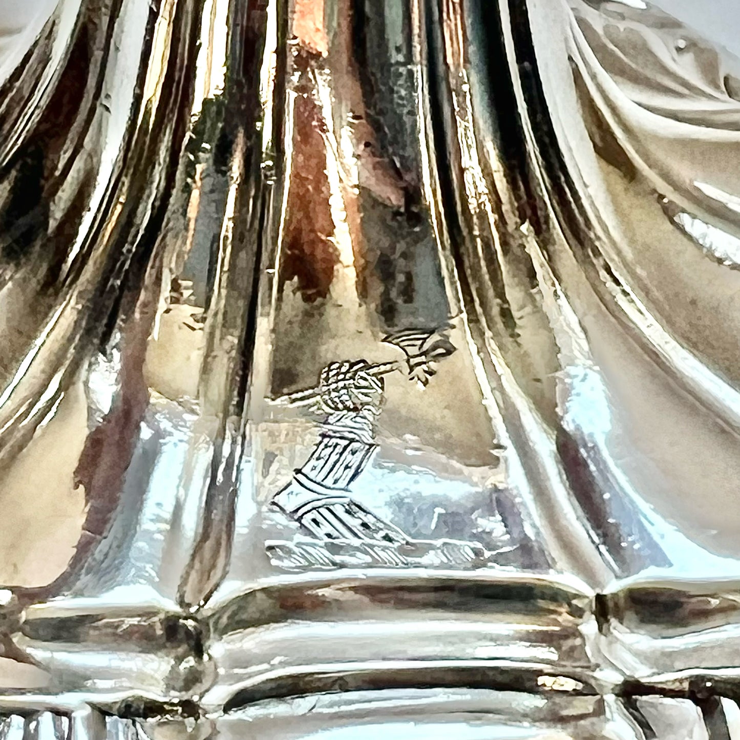 Pair of crested George III sterling silver cast candlesticks by William Cafe, London 1761 and 1762