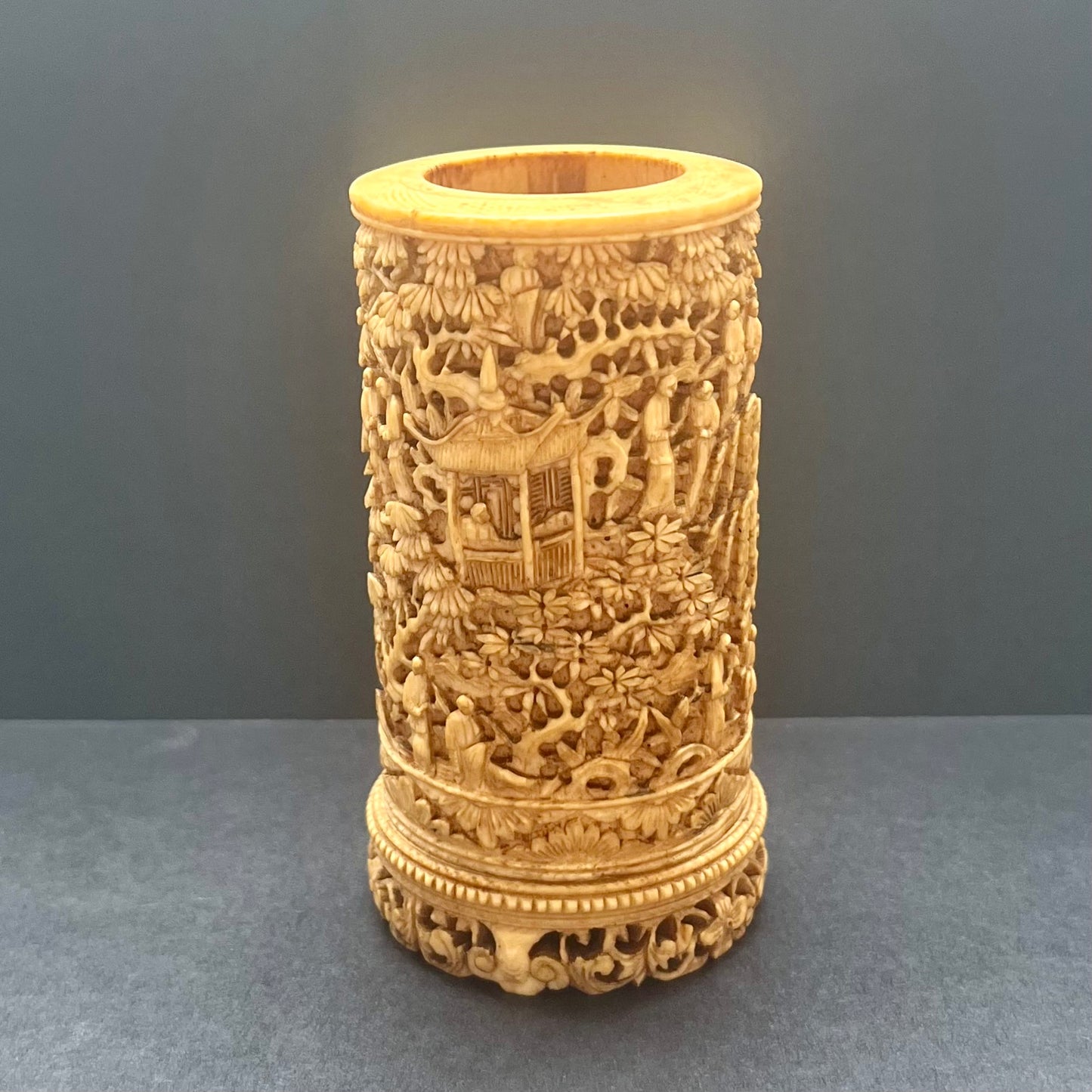Exceptional late 18th to mid 19th century Qing Dynasty Chinese ivory brush holder with finely carved pavilion scenes