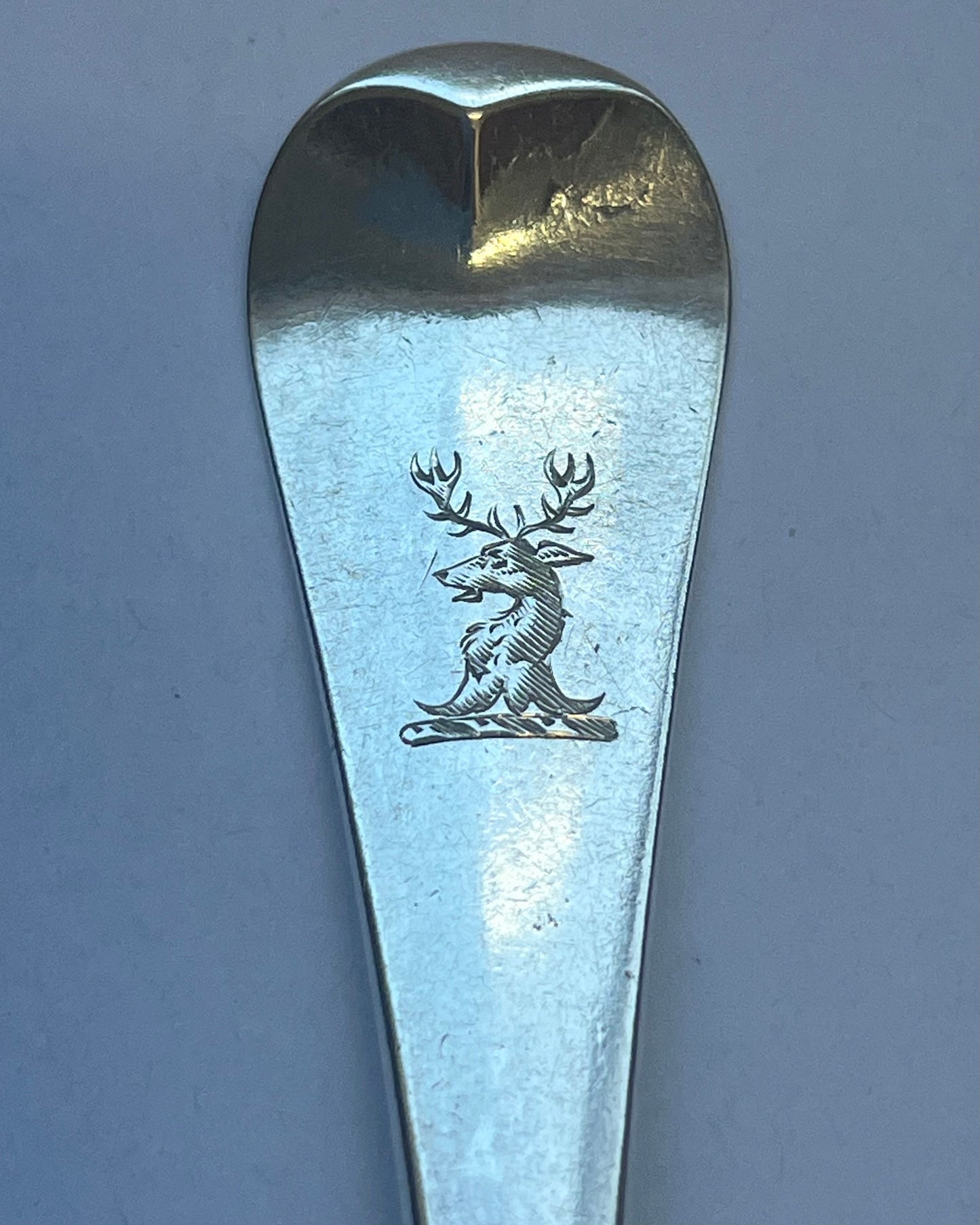 George II crested sterling silver tablespoon, with marks for Samuel Holmes, London, 1747