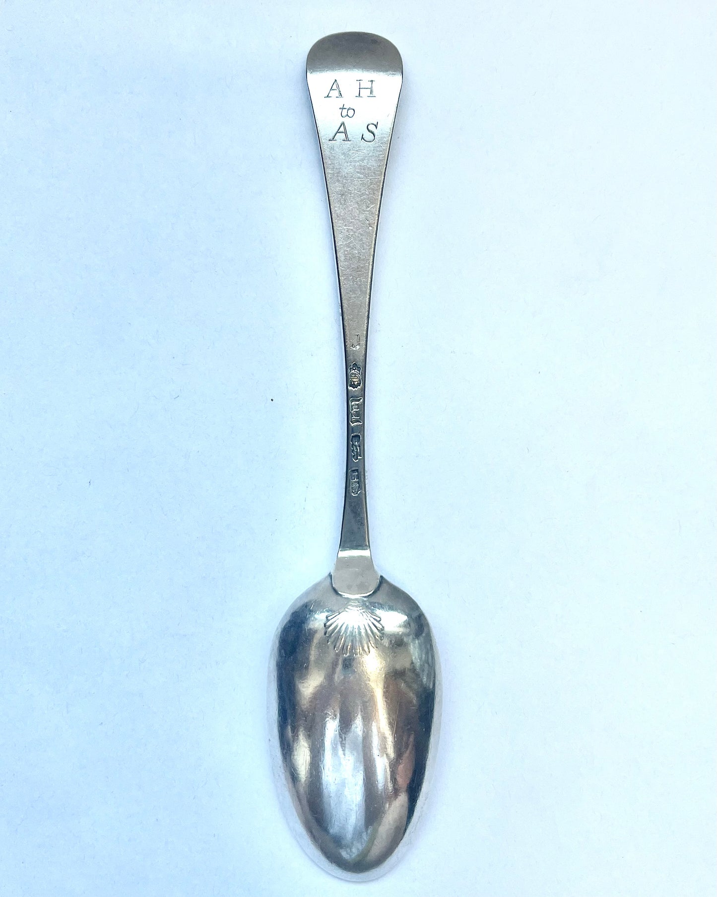 George II crested sterling silver tablespoon, with marks for Samuel Holmes, London, 1747
