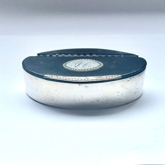 Antique English late Georgian sterling silver and leather snuff box circa 18th century with hammered details