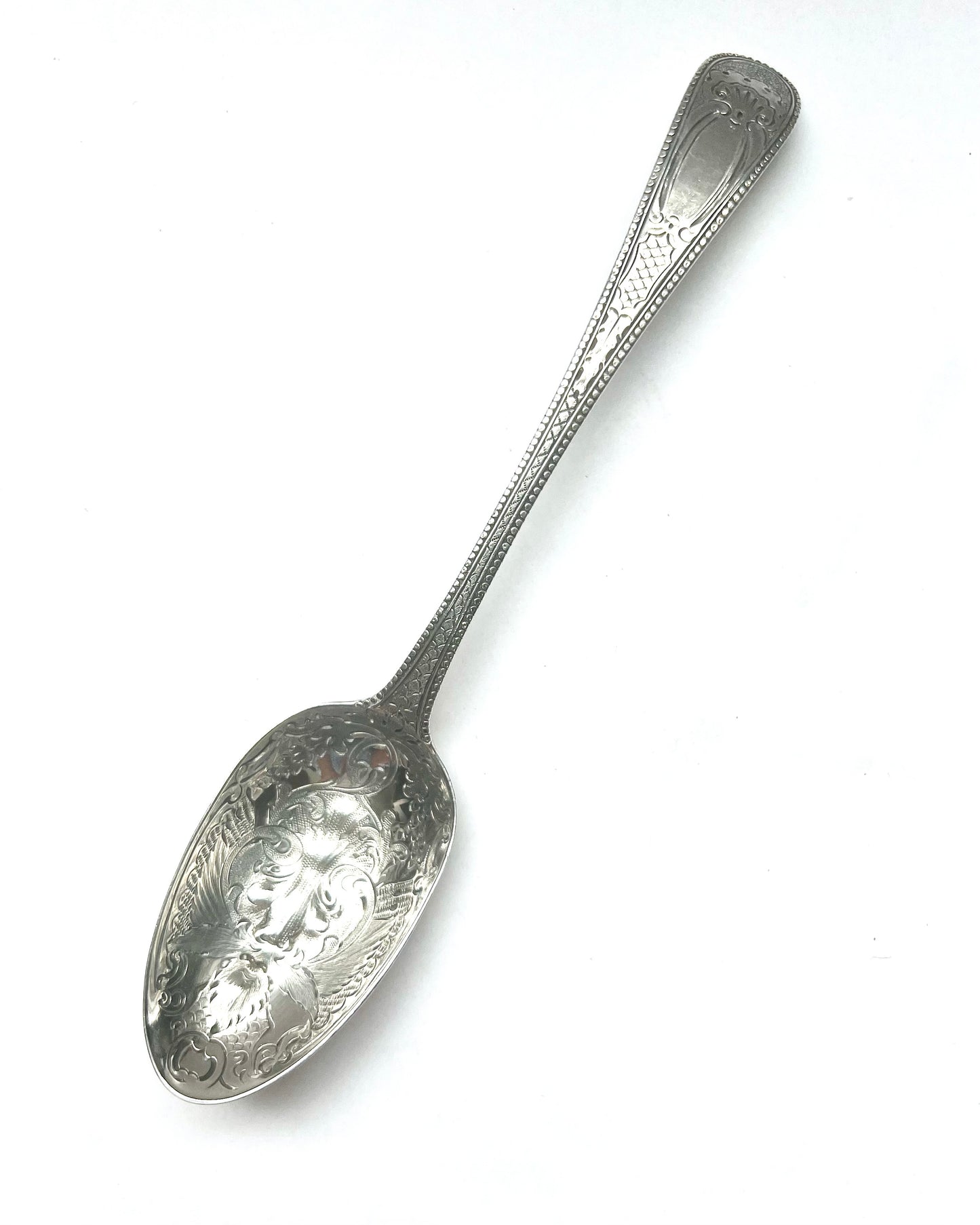Par de cucharas georgianas de plata de ley "Green Man", marcas de Thomas Tookey, Londres, 1777