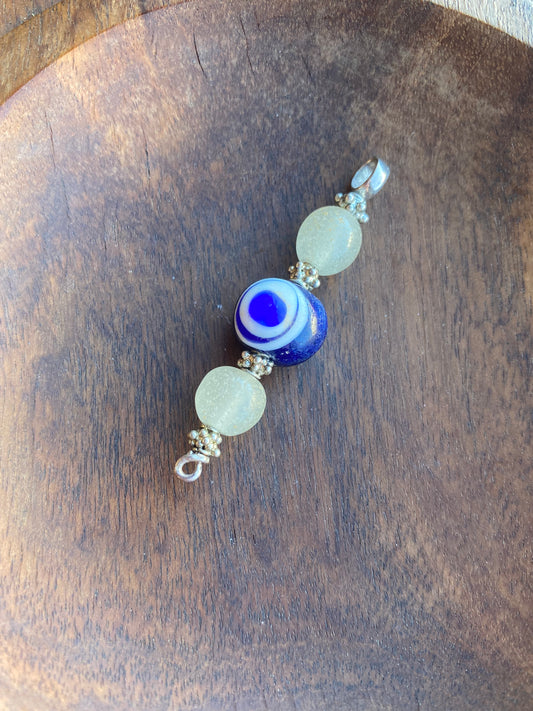 Cuentas comerciales javanesas antiguas: ojo de millefiori y colgante de cuentas del Indopacífico