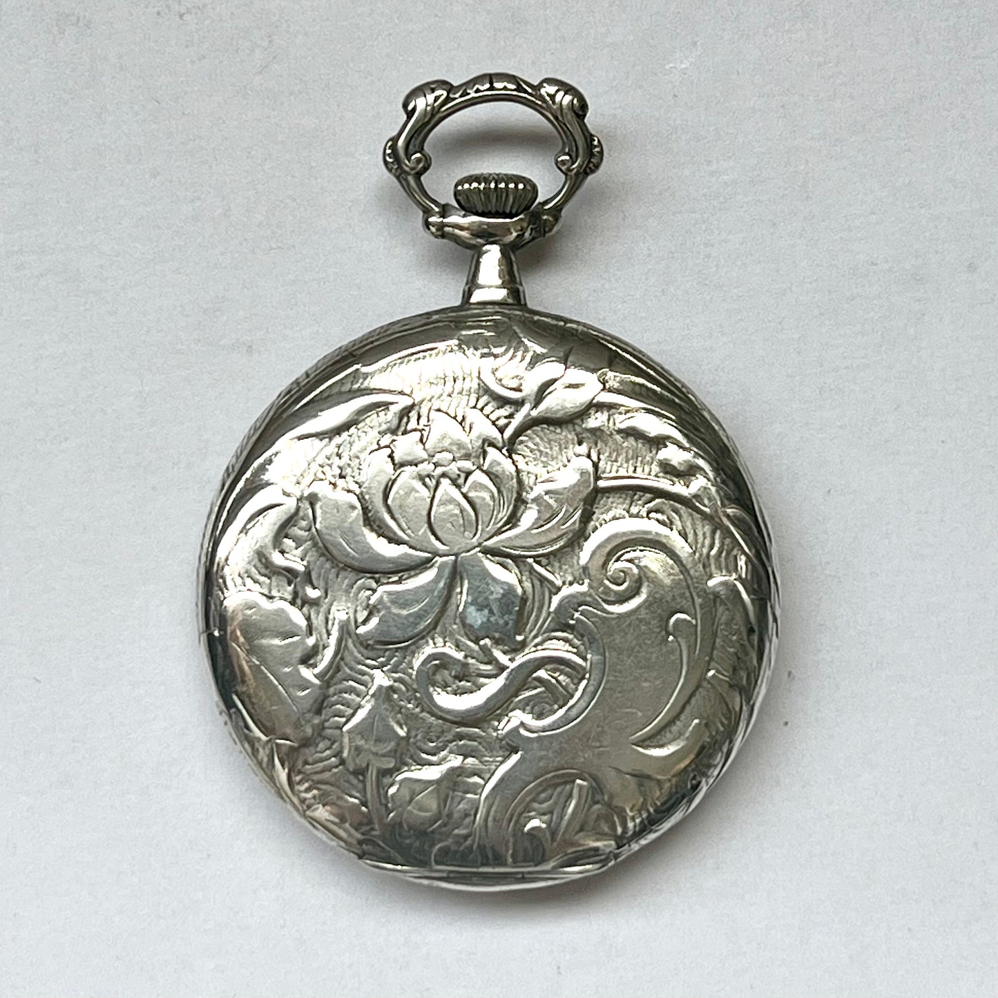 Antique 1920s .800 silver cased Swiss open face pocket watch with Travail watch movement, Art Nouveau style florals