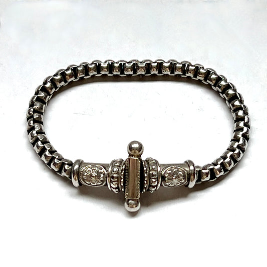 Elegant Vintage Tribal Silver Bracelet with Floral Embossed Clasp