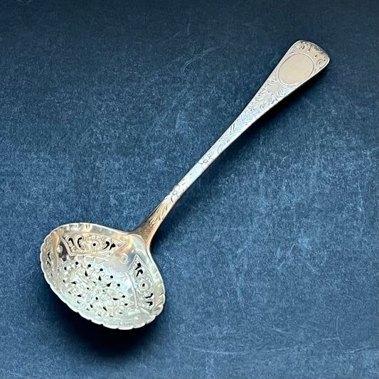 William IV Regency period sterling silver sugar sifter spoon. Hallmarked Joseph & Albert Savory, 1836 , London.