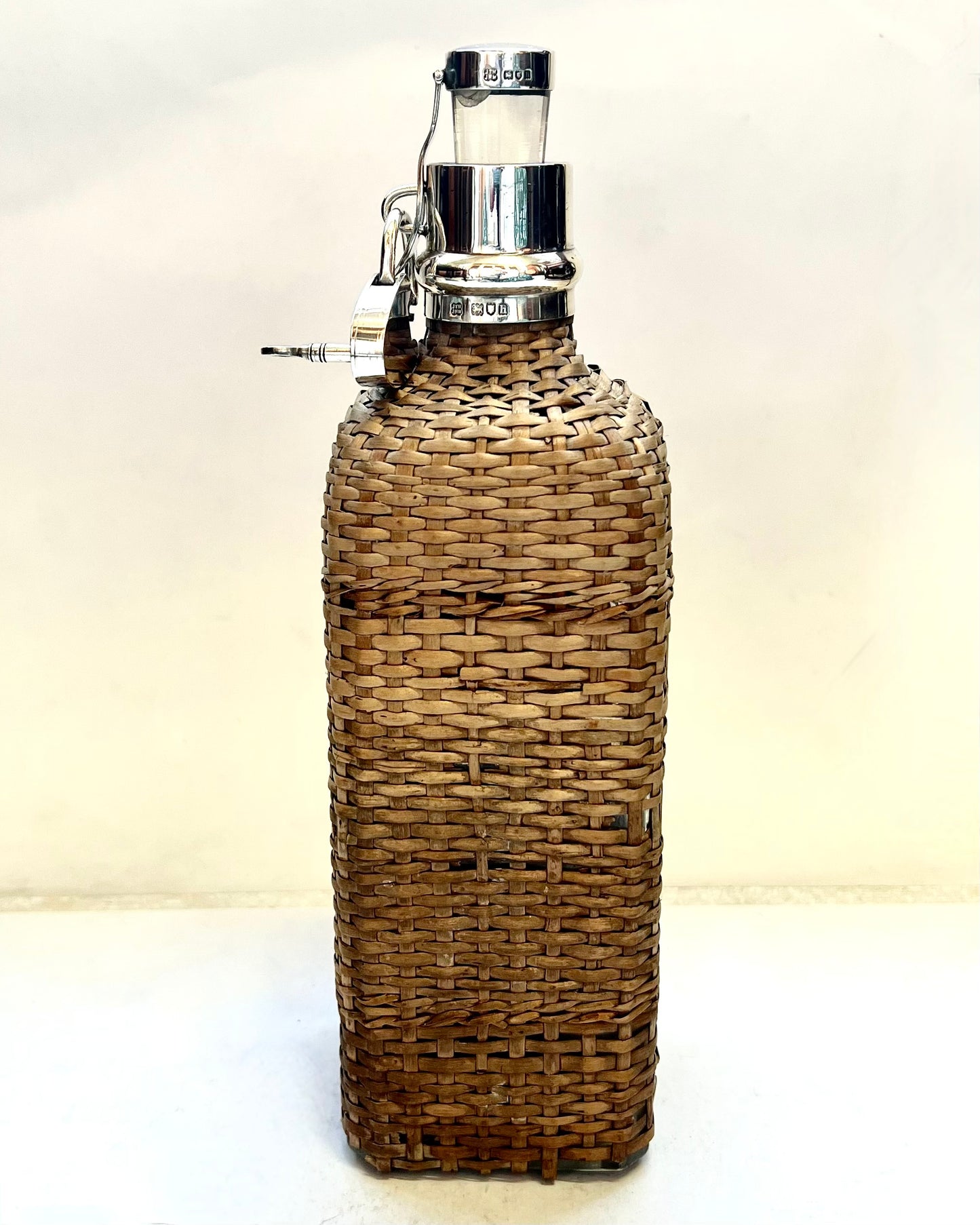 Edwardian wicker and sterling silver bottle, London 1903, Hukin & Heath