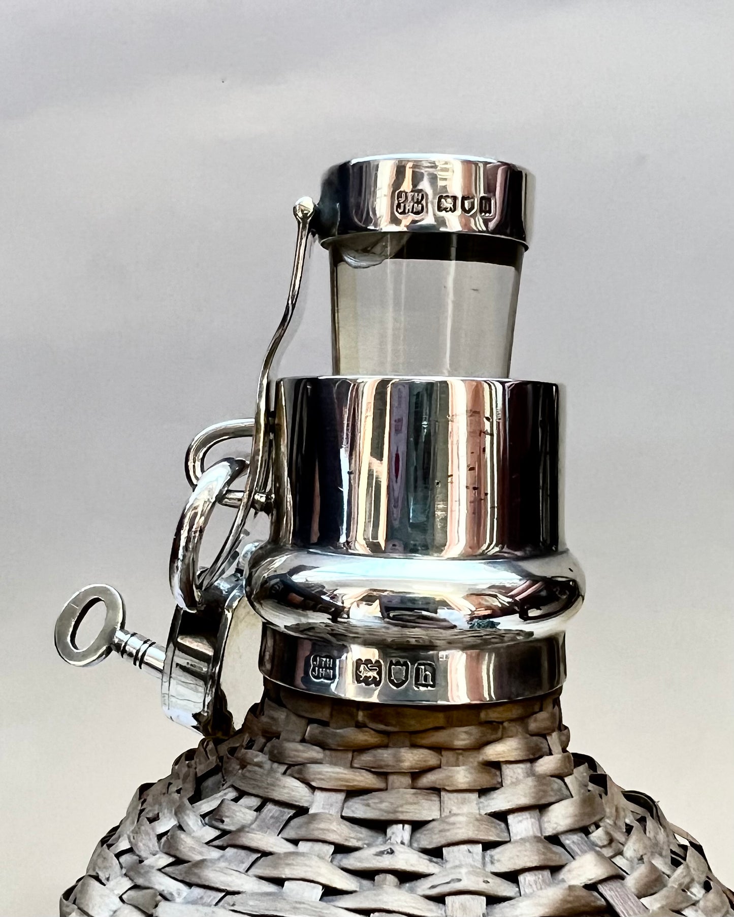 Edwardian wicker and sterling silver bottle, London 1903, Hukin & Heath