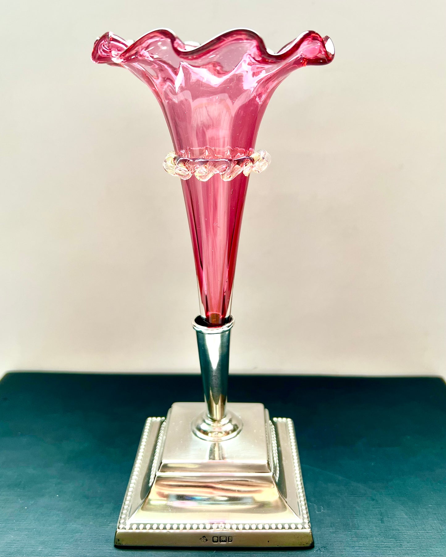 Pair of antique Edwardian cranberry glass epergnes with sterling silver bases