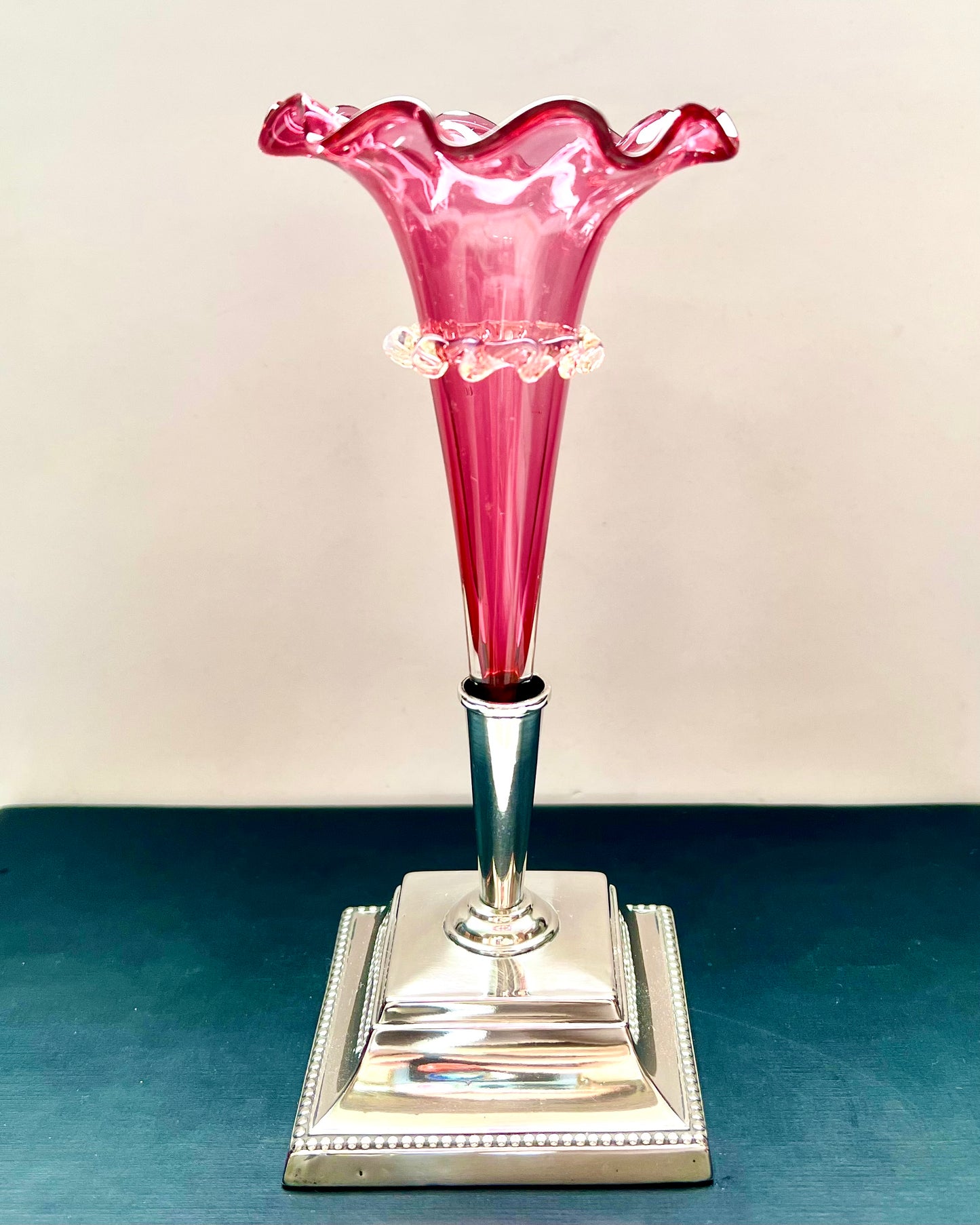 Pair of antique Edwardian cranberry glass epergnes with sterling silver bases