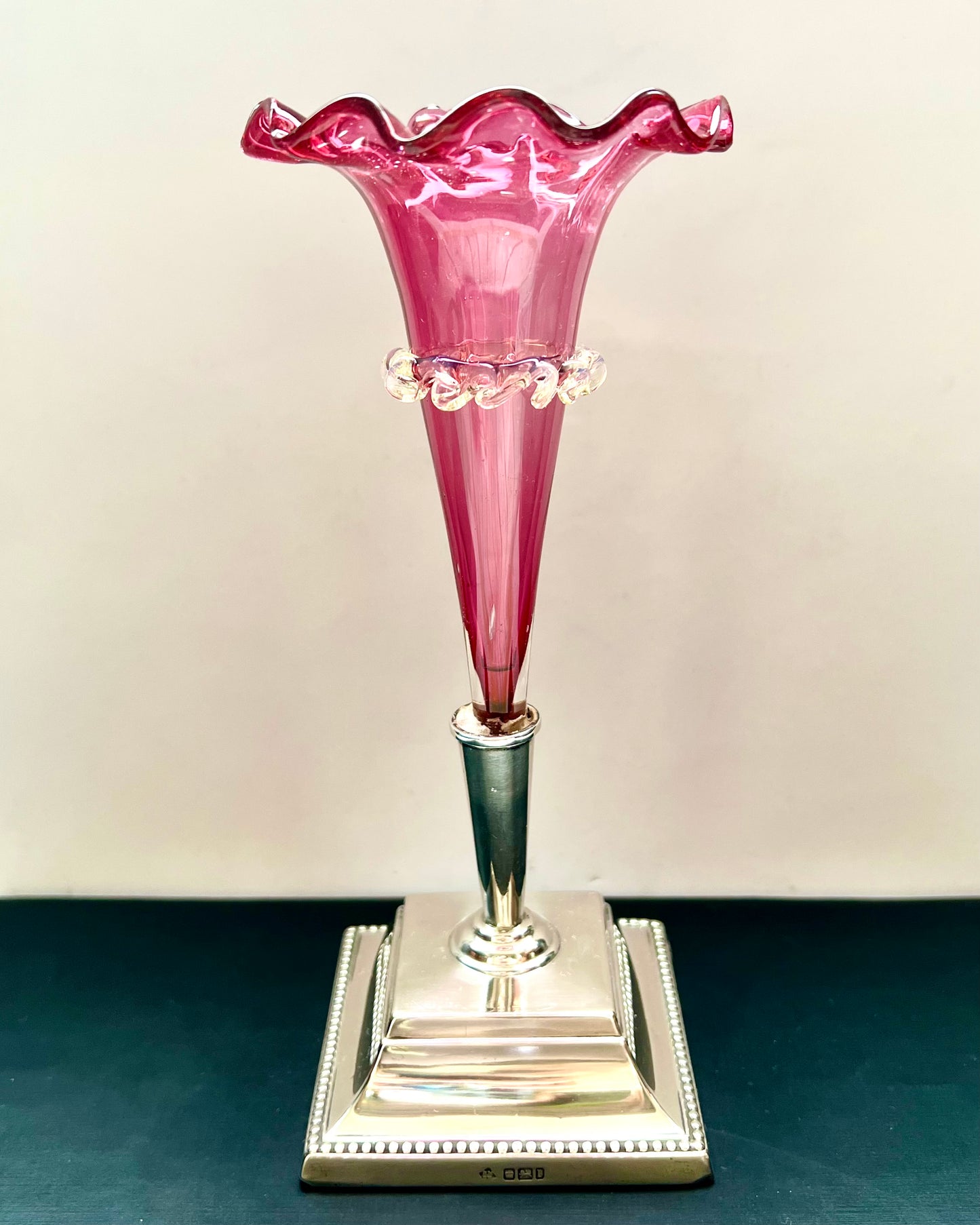 Pair of antique Edwardian cranberry glass epergnes with sterling silver bases