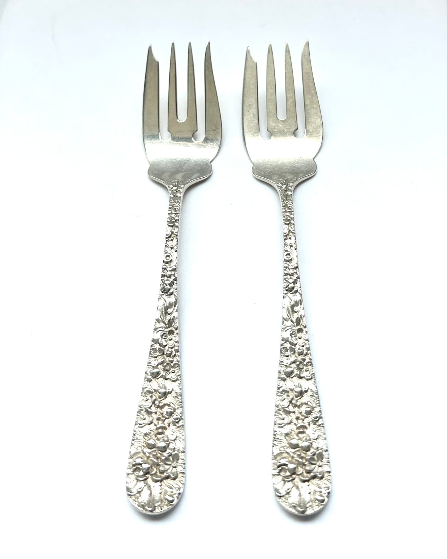 Vintage 1930s American sterling silver Rose Pattern salad fork by Stieff of Baltimore, Maryland.