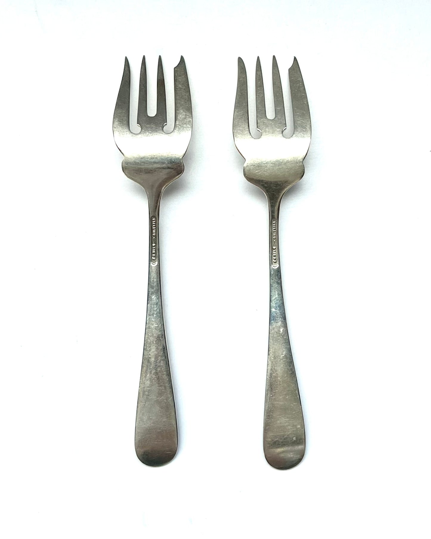 Vintage 1930s American sterling silver Rose Pattern salad fork by Stieff of Baltimore, Maryland.